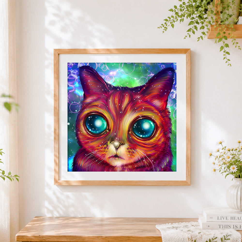 Finished dreamy cosmic cat cross stitch artwork displayed