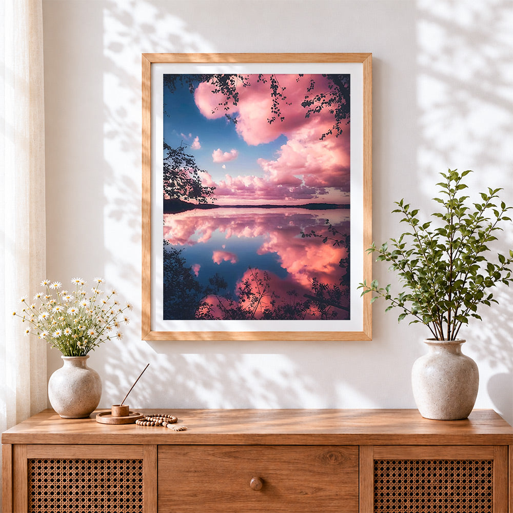 Finished dreamy pink cloud reflection cross stitch artwork displayed