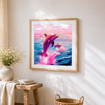 Dreamy pink dolphins cross stitch artwork displayed on wall as home decor