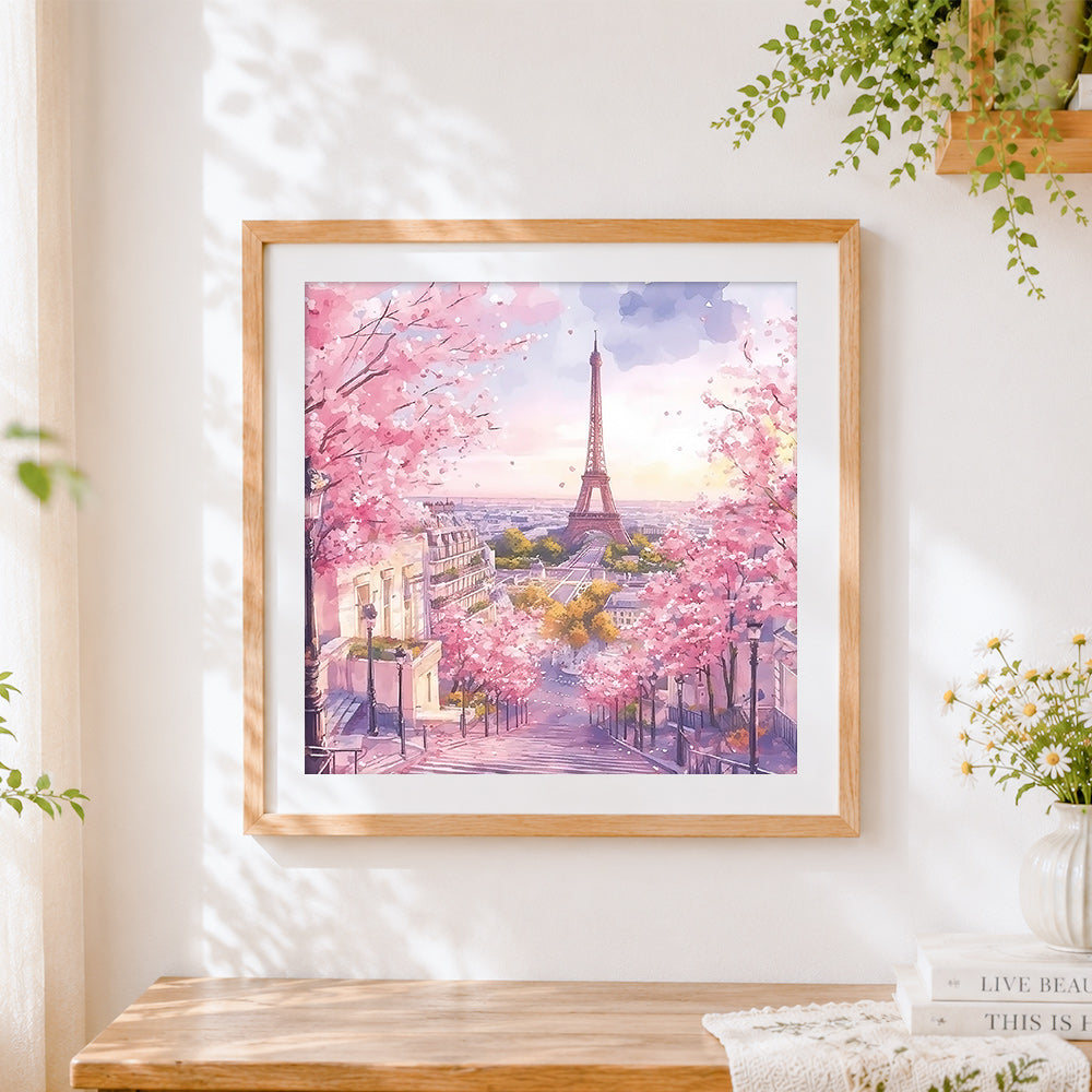 Finished dreamy pink eiffel tower cross stitch artwork displayed