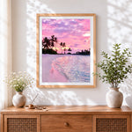 Finished dreamy pink glitter beach cross stitch artwork displayed