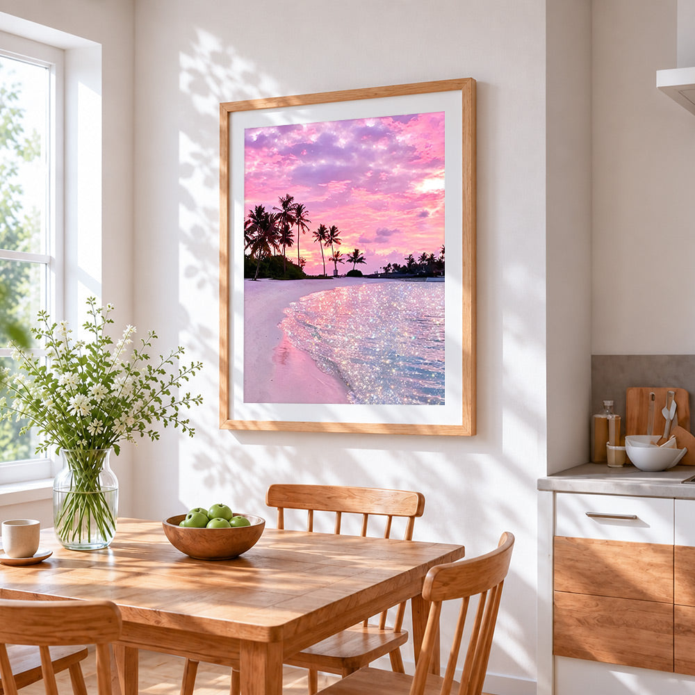 Dreamy pink glitter beach cross stitch artwork displayed on wall as home decor