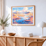Dreamy stream in a pastel valley cross stitch artwork displayed on wall as home decor