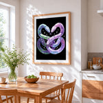Dreamy twin snakes entwined cross stitch artwork displayed on wall as home decor