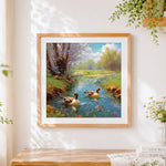 Finished ducks swimming in a spring stream cross stitch artwork displayed