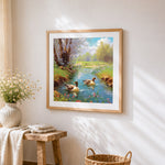 Ducks swimming in a spring stream cross stitch artwork displayed on wall as home decor
