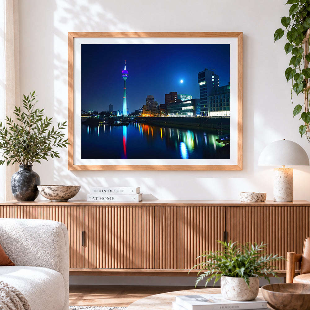 Finished düsseldorf rhine tower at night cross stitch artwork displayed