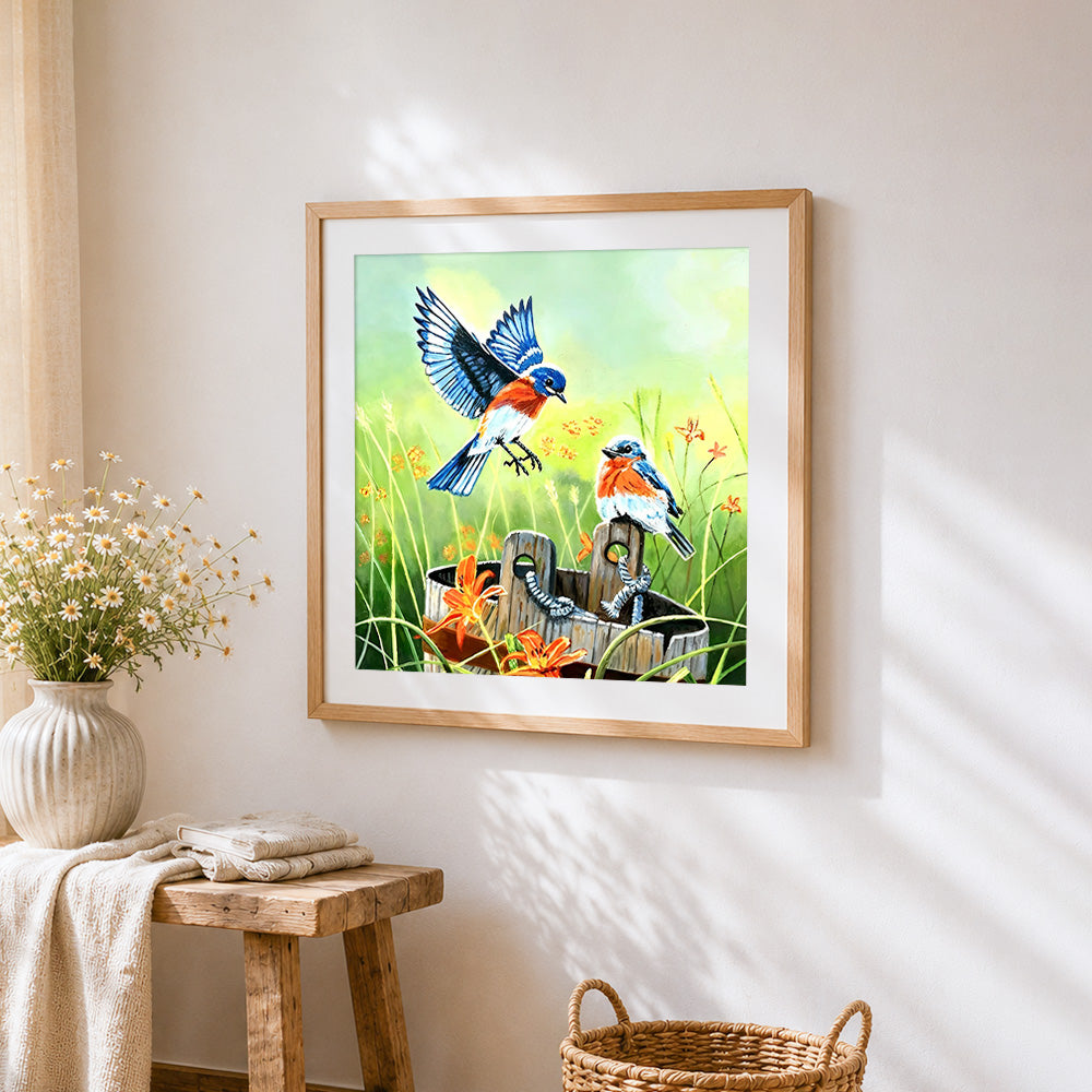 Eastern bluebirds and wooden bucket cross stitch artwork displayed on wall as home decor