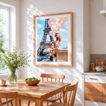 Eiffel tower and pink balloons cross stitch artwork displayed on wall as home decor