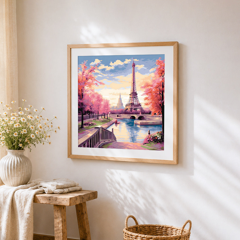 Eiffel tower at sunset in autumn cross stitch artwork displayed on wall as home decor