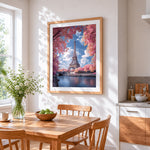 Eiffel tower in pink blossom cross stitch artwork displayed on wall as home decor