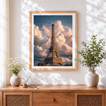 Finished eiffel tower under dramatic clouds cross stitch artwork displayed