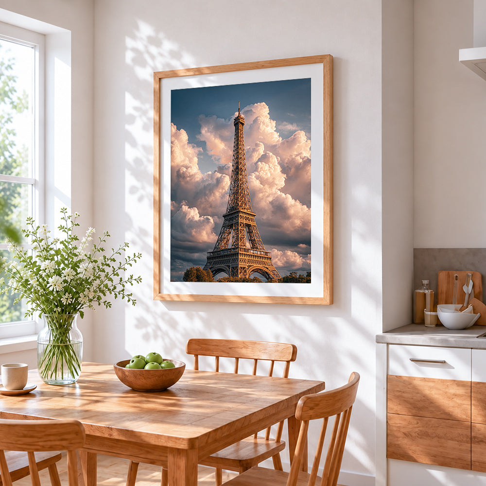 Eiffel tower under dramatic clouds cross stitch artwork displayed on wall as home decor
