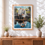 Finished elderly couple sitting by water cross stitch artwork displayed