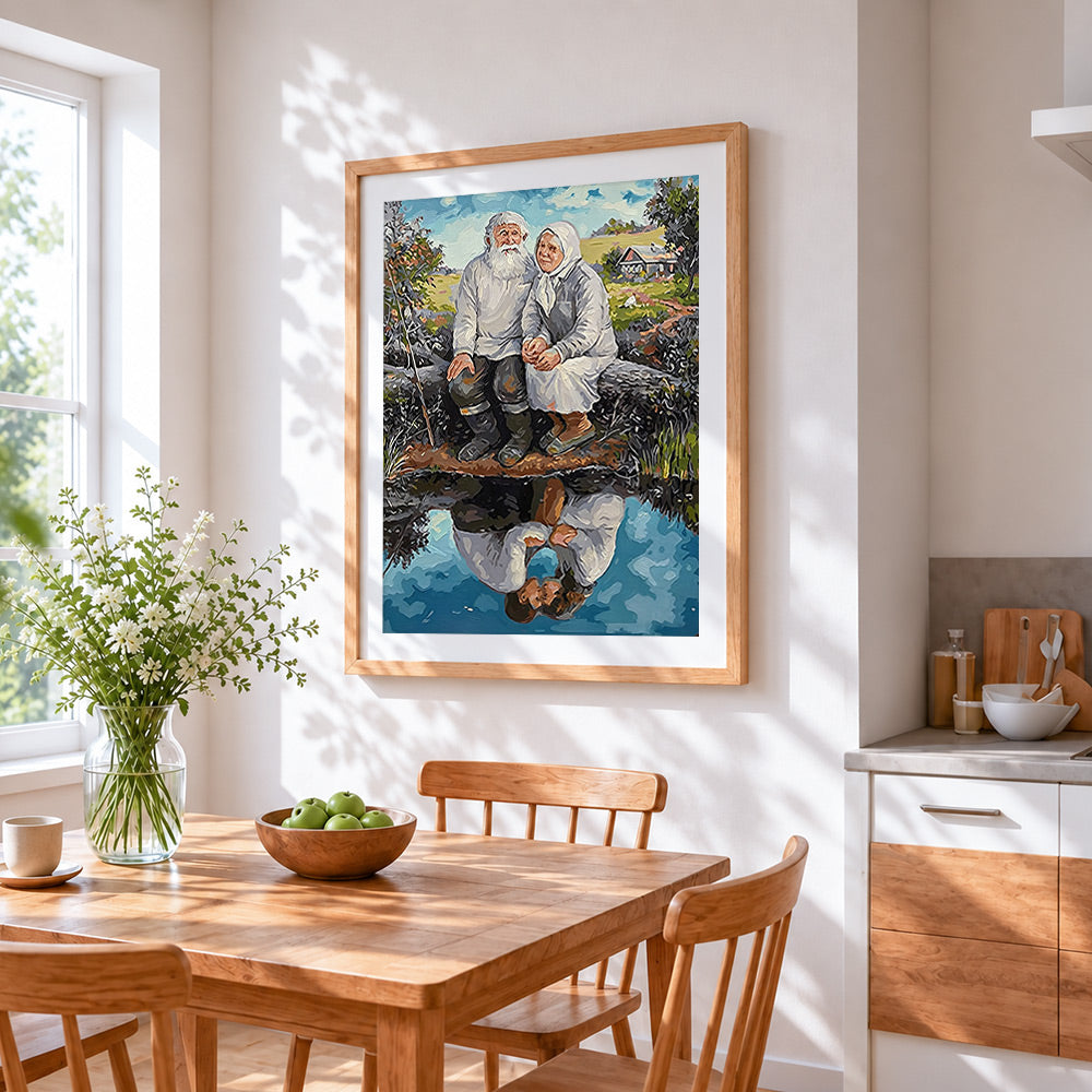 Elderly couple sitting by water cross stitch artwork displayed on wall as home decor