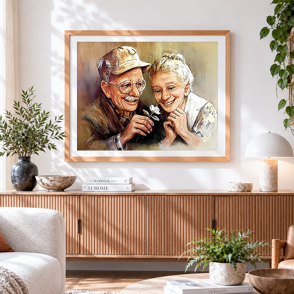 Finished elderly couple with a white flower cross stitch artwork displayed