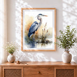 Finished elegant grey heron in watercolour cross stitch artwork displayed