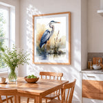 Elegant grey heron in watercolour cross stitch artwork displayed on wall as home decor