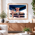 Finished elegant lady with martini and wide brim hat cross stitch artwork displayed