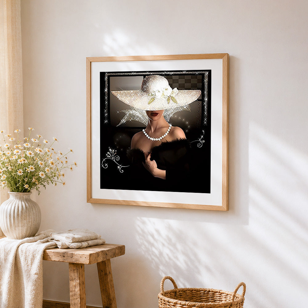 Elegant lady with white hat paint by numbers artwork displayed on wall as home decor