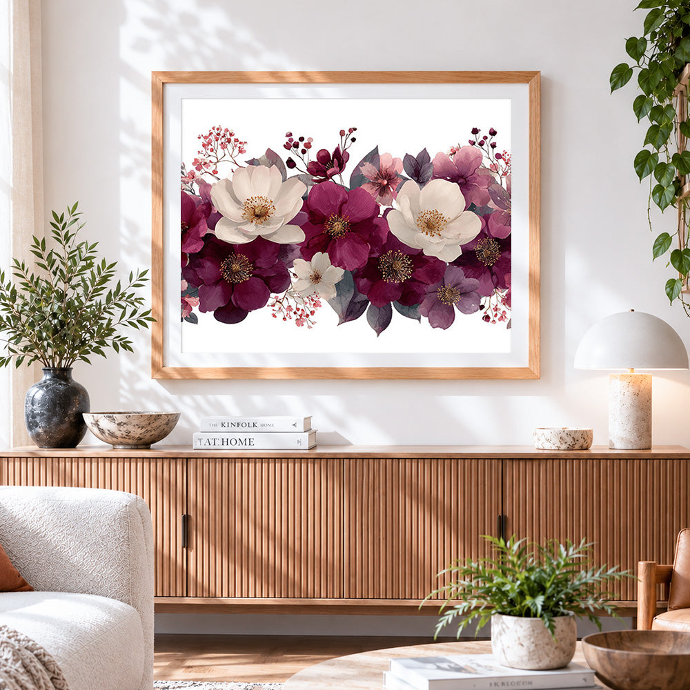 Finished elegant plum and white flowers cross stitch artwork displayed