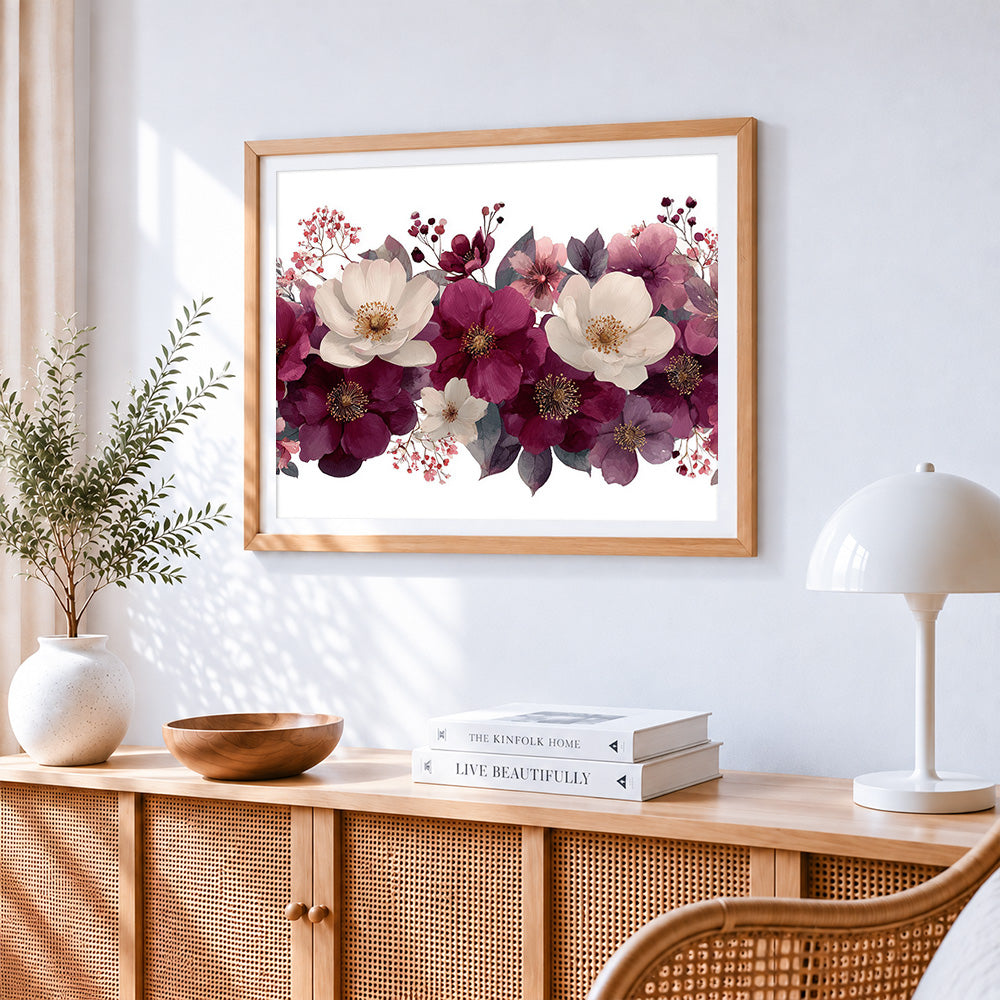 Elegant plum and white flowers cross stitch artwork displayed on wall as home decor