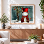 Finished elegant snowman with red hat cross stitch artwork displayed