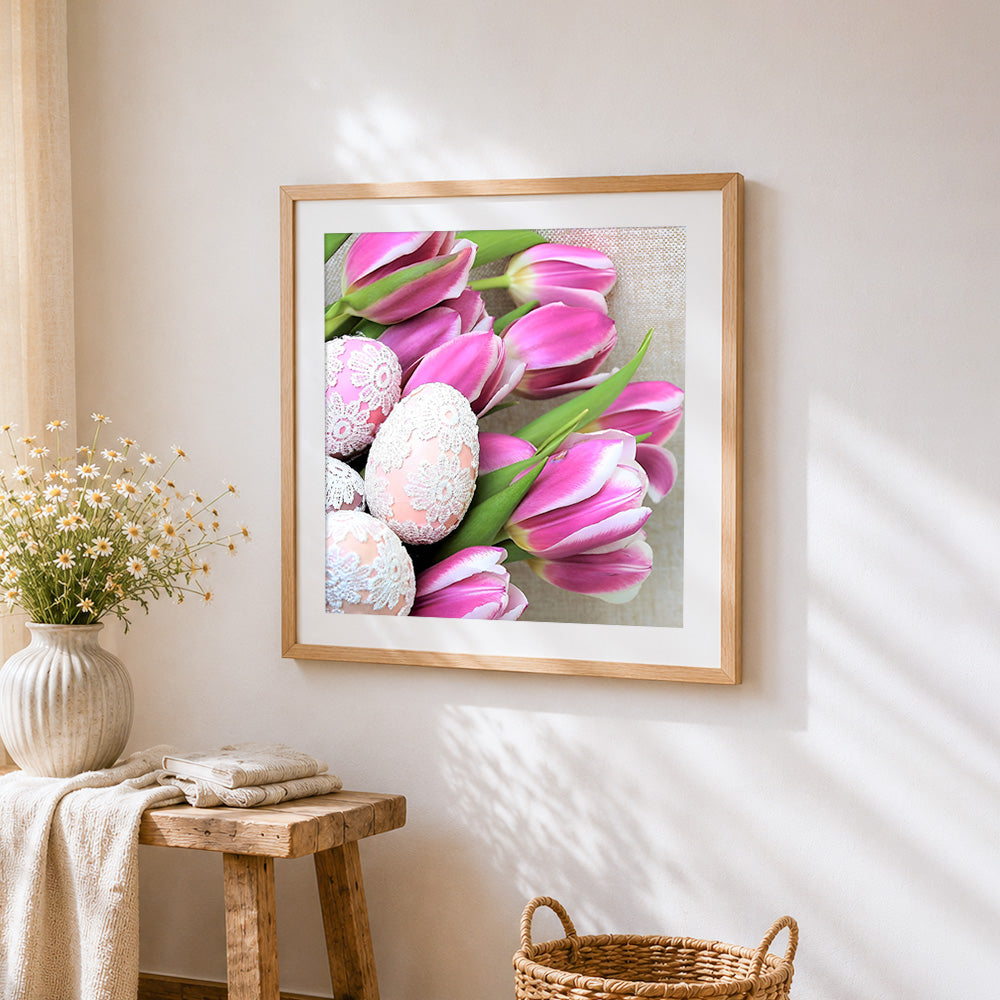 Elegant tulips and lace decorated easter eggs cross stitch artwork displayed on wall as home decor