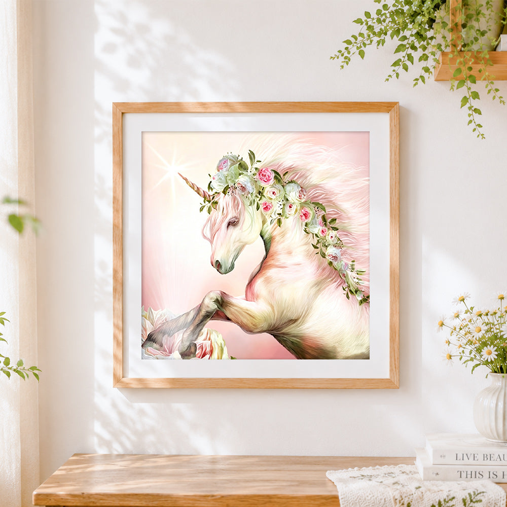 Finished elegant unicorn with floral crown cross stitch artwork displayed