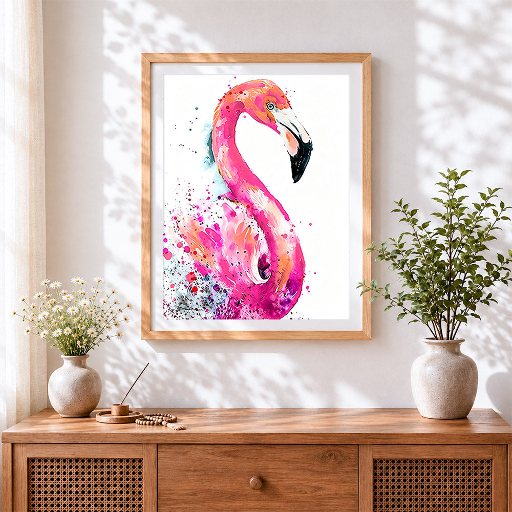 Finished elegant watercolour flamingo cross stitch artwork displayed