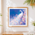 Finished elegant white peacock with flowers cross stitch artwork displayed