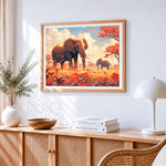 Elephant and calf in a floral meadow cross stitch artwork displayed on wall as home decor