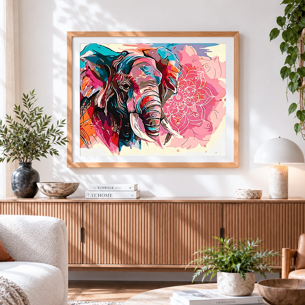 Finished elephant and pink mandala cross stitch artwork displayed