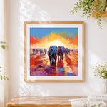 Finished elephant herd at sunset cross stitch artwork displayed