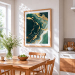 Emerald green and gold fluid art cross stitch artwork displayed on wall as home decor