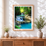 Finished enchanted forest waterfall cross stitch artwork displayed