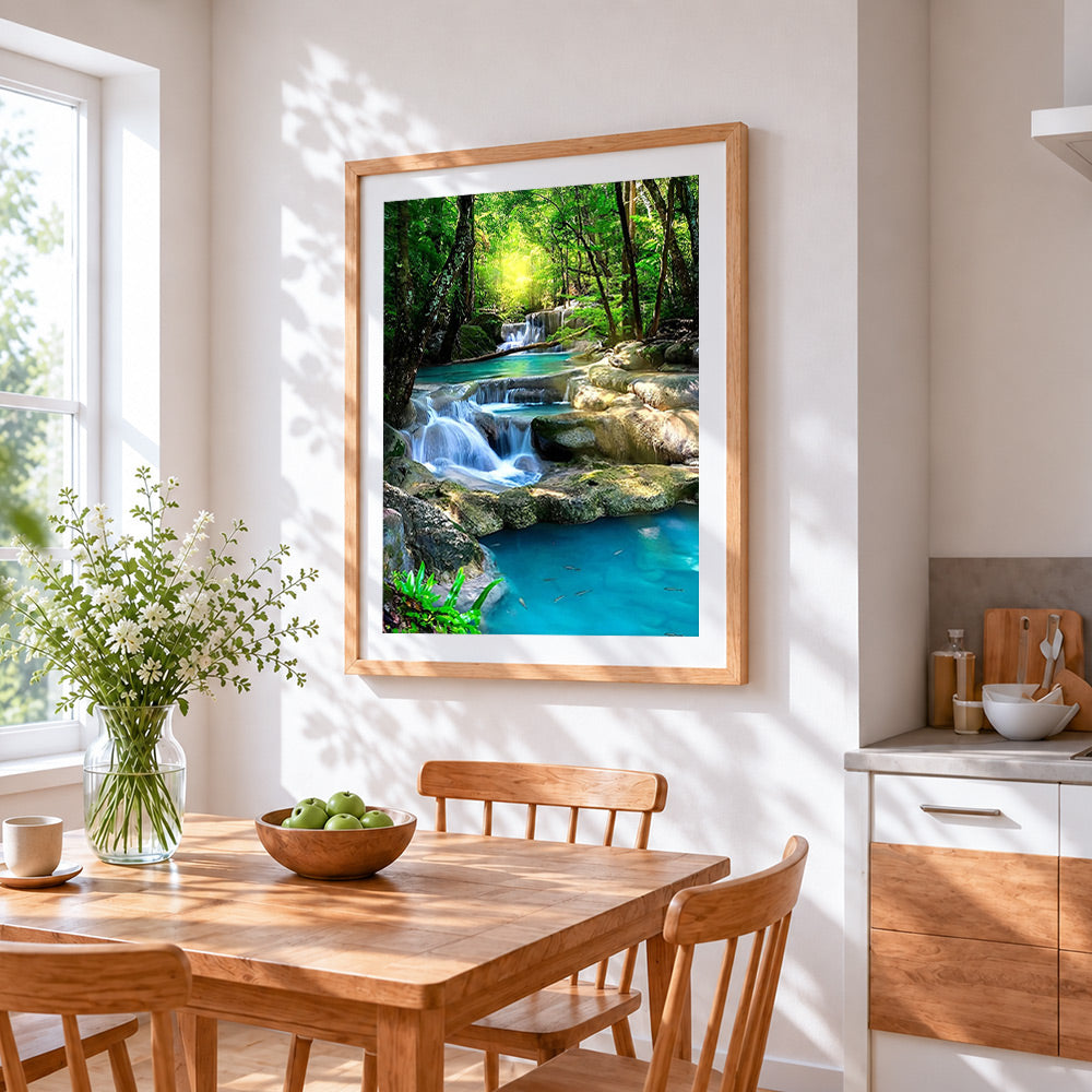 Enchanted forest waterfall cross stitch artwork displayed on wall as home decor
