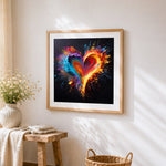 Exploding paint splatter heart cross stitch artwork displayed on wall as home decor