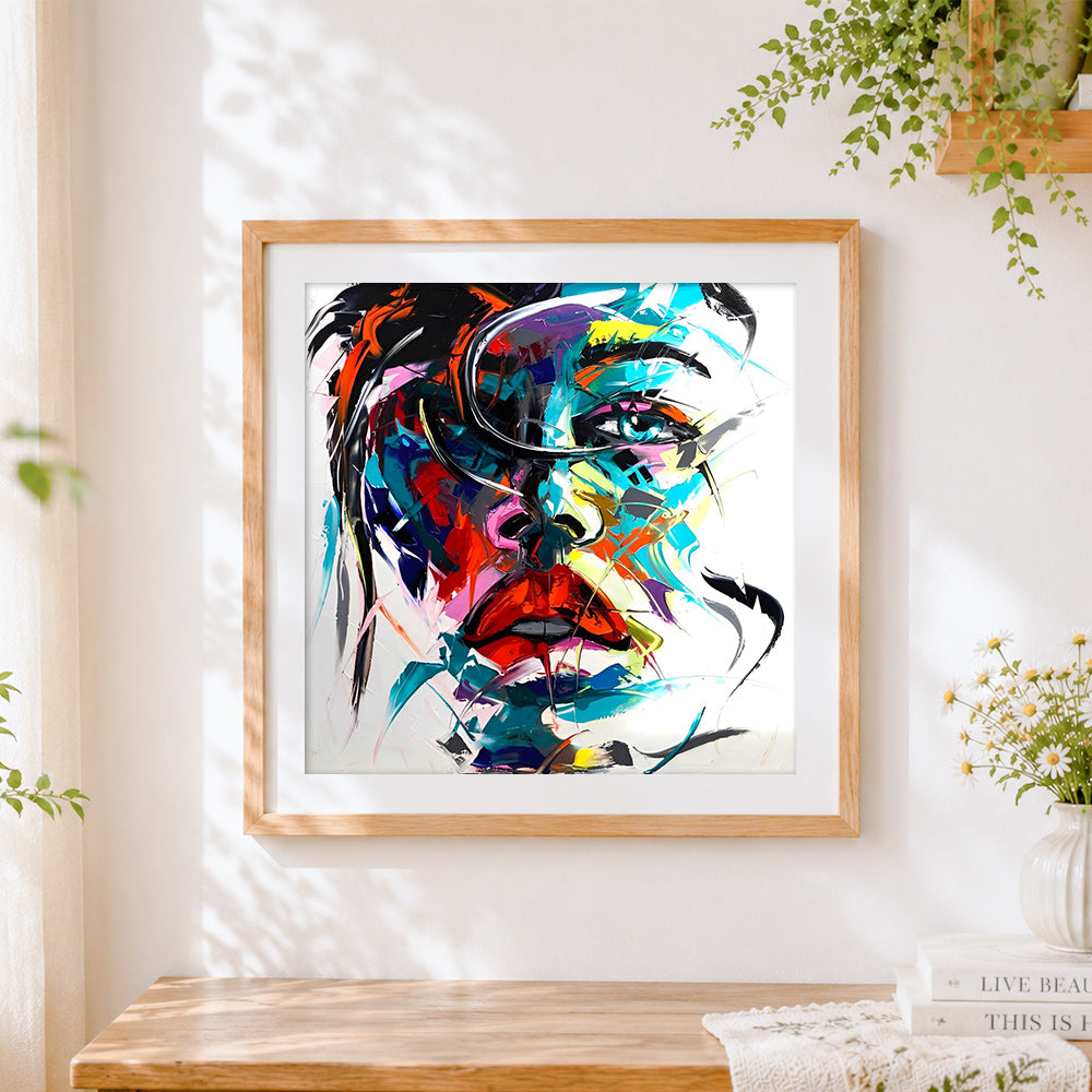 Finished expressionist portrait in bold colours cross stitch artwork displayed