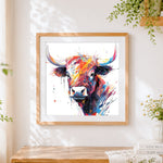 Finished expressive watercolour highland cow cross stitch artwork displayed