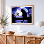 Fairy and black cat silhouette cross stitch artwork displayed on wall as home decor