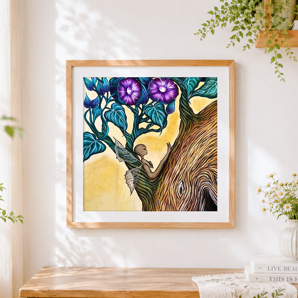 Finished fairy in a tree with purple flowers cross stitch artwork displayed
