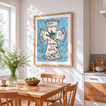 Faith, hope and love cross cross stitch artwork displayed on wall as home decor