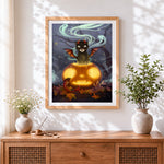 Finished fantasy creature on glowing pumpkin cross stitch artwork displayed