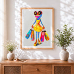 Finished fashionable frog with shopping bags cross stitch artwork displayed