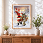 Finished father christmas and donkey with gifts cross stitch artwork displayed
