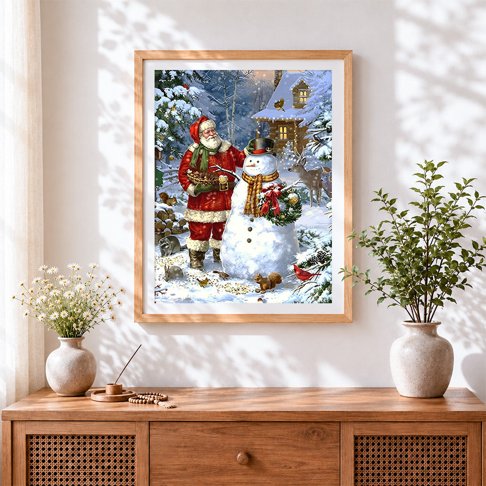 Finished father christmas and snowman cross stitch artwork displayed