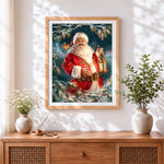 Finished father christmas and snowy pine branches cross stitch artwork displayed