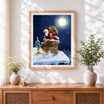 Finished father christmas climbing a snowy chimney cross stitch artwork displayed