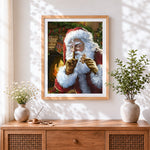Finished father christmas eating a gingerbread man cross stitch artwork displayed